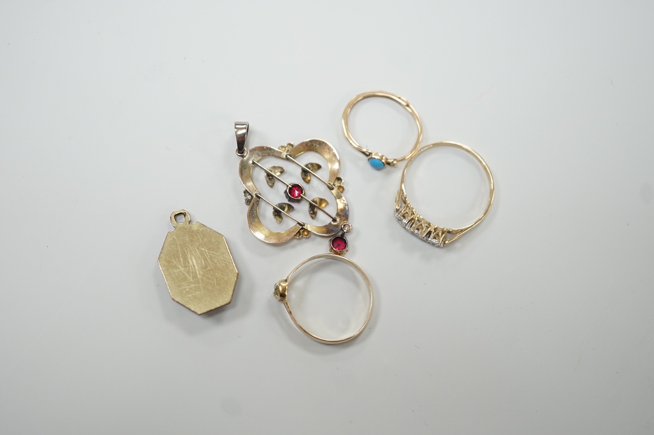 A yellow metal and old mine cut solitaire diamond set ring, size N, gross 1.1 grams, a 9ct gold and three stone diamond chip set ring, a yellow metal and turquoise set earring, an enamelled pendant and a 9ct and gem set